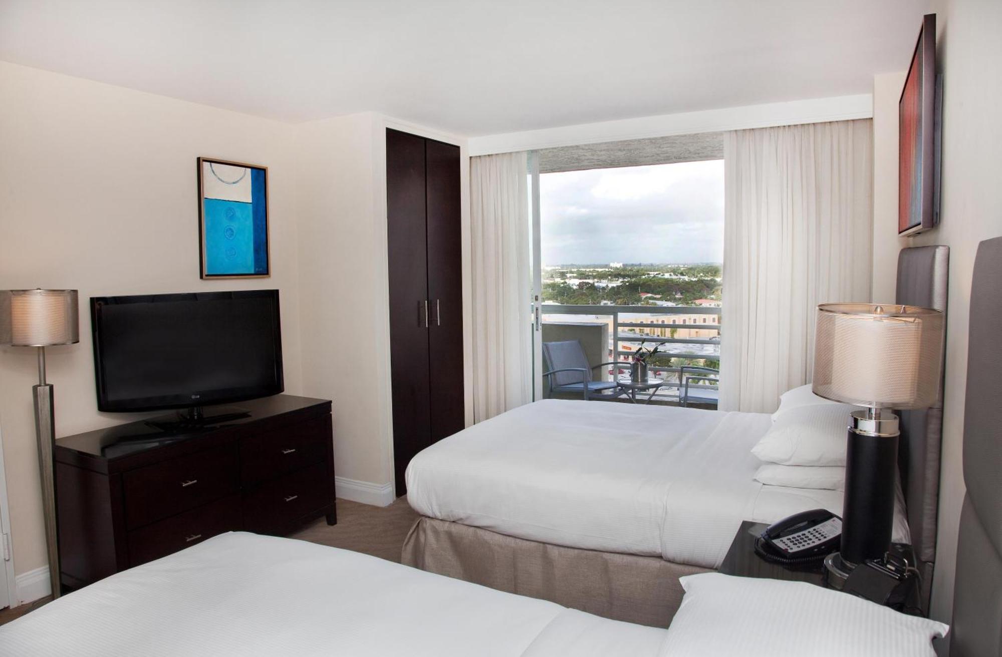 Queen Suite Balcony Pool View
